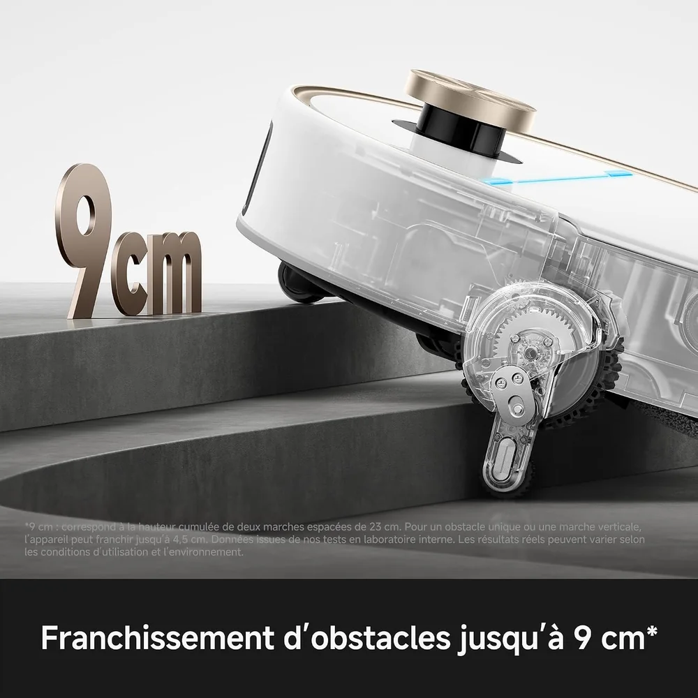 MOVA V70 Ultra Complete franchissant une marche grâce à ses jambes robotisées, avec l'indication 9 cm